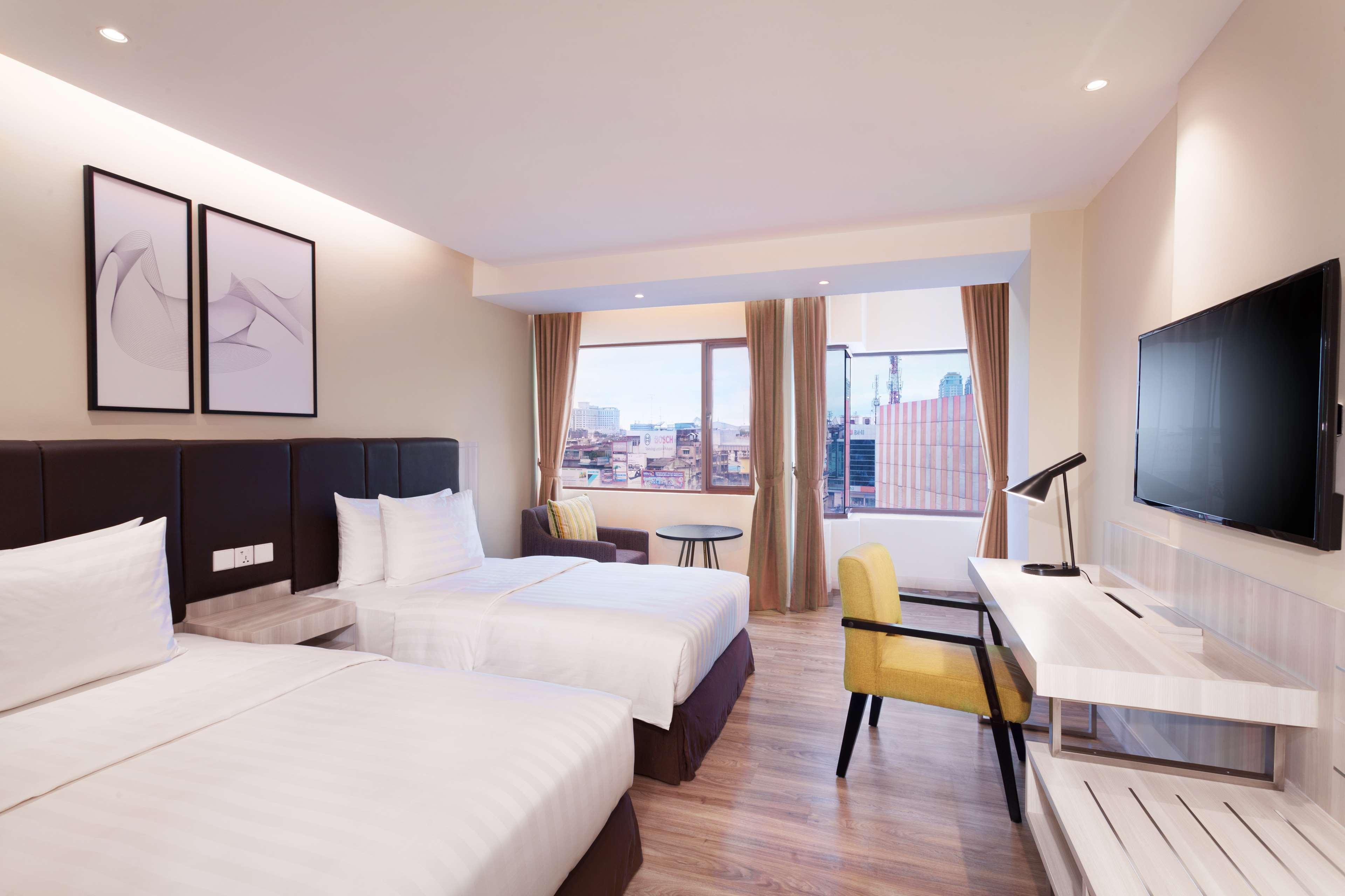 Aiho Hotel Medan Habitación foto